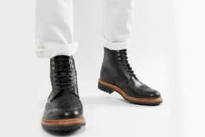 Black leather brogue boots
