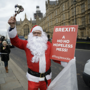 A man dressed as Santa protests Brexit in Westminster