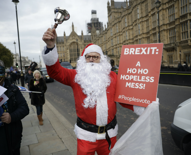 A man dressed as Santa protests Brexit in Westminster