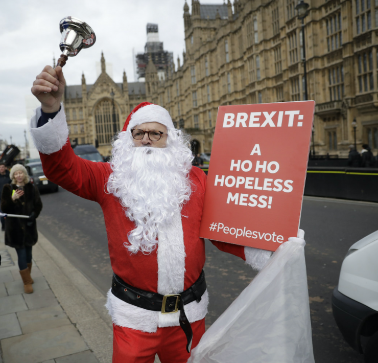 A man dressed as Santa protests Brexit in Westminster