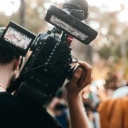 man holding a video camera