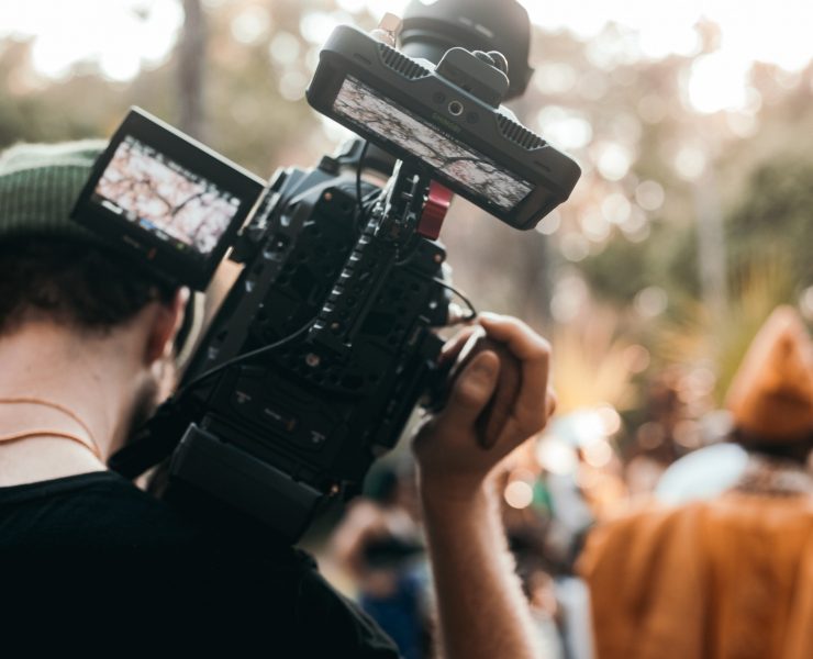 man holding a video camera