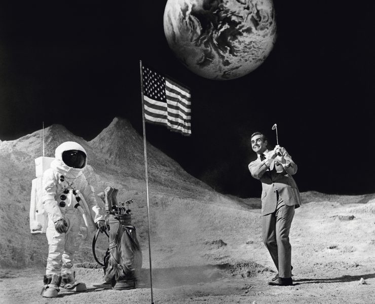 Scottish actor Sean Connery as James Bond plays golf on a deserted film set in Pinewood Studios in London during the filming of 'Diamonds Are Forever', 1971.