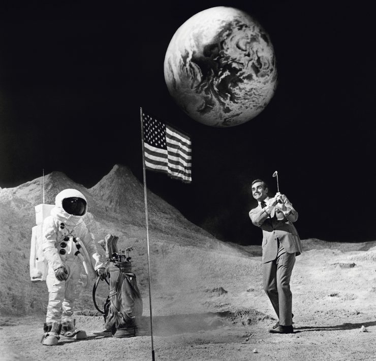 Scottish actor Sean Connery as James Bond plays golf on a deserted film set in Pinewood Studios in London during the filming of 'Diamonds Are Forever', 1971.