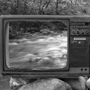 Tv by a stream