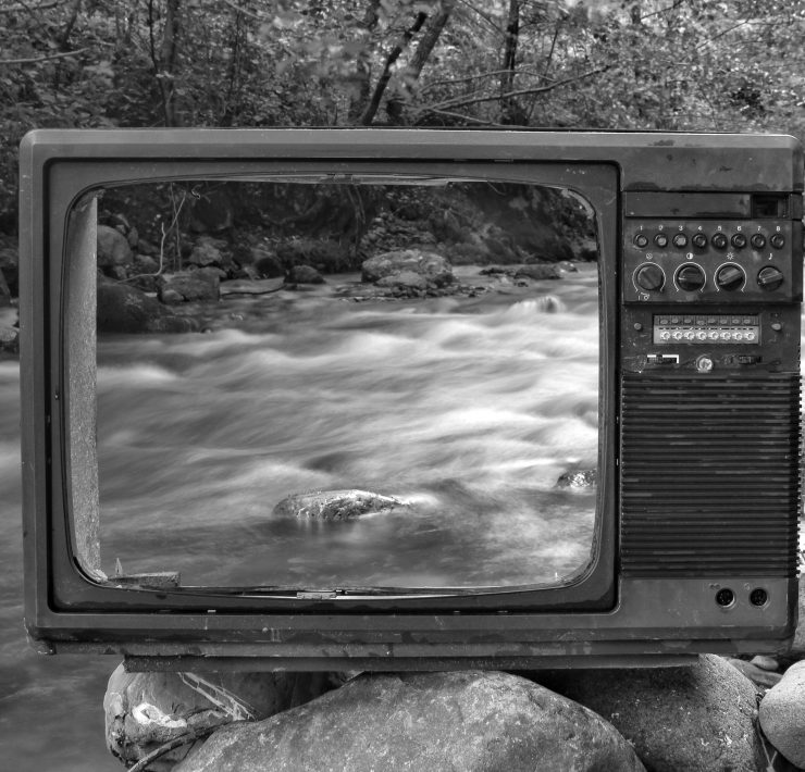 Tv by a stream