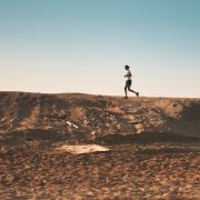 Man running on a dirt road