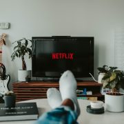 Man watching Netflix from his couch