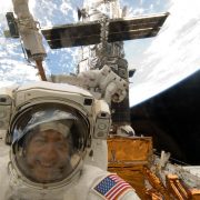 Mike Massimino fixing the Hubble telescope