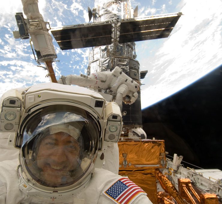 Mike Massimino fixing the Hubble telescope
