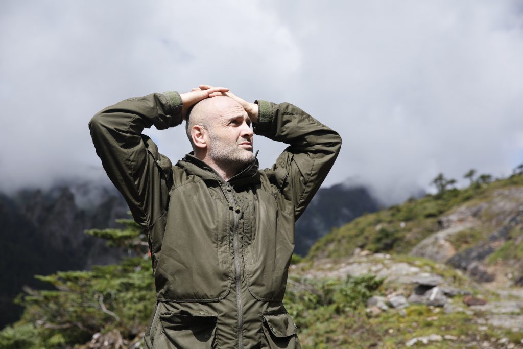 Ed Stafford looking up at the sky