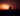 man sat watching sunset