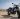 Motorbike parked on a dirt road