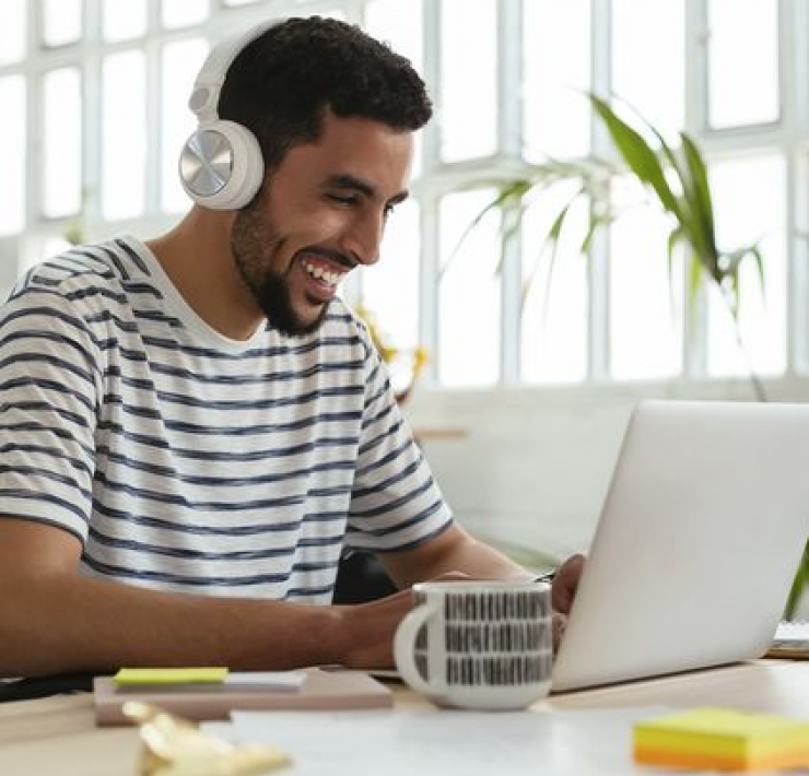 man in office on laptop