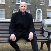 Geoff Thompson sat on a bench