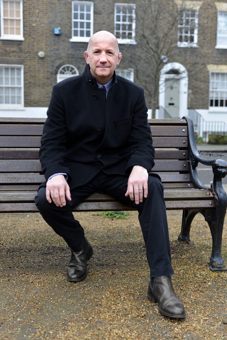 Geoff Thompson sat on a bench