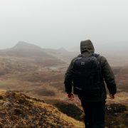 Stubble & Co bag worn by man on a misty mountian