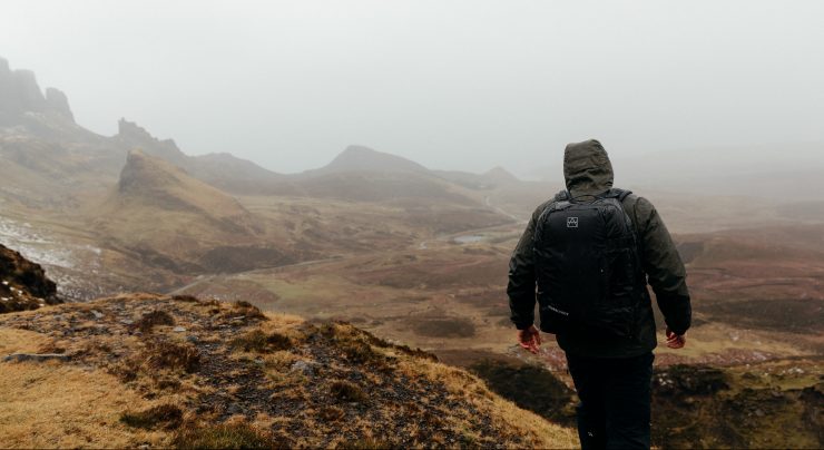 Stubble & Co bag worn by man on a misty mountian