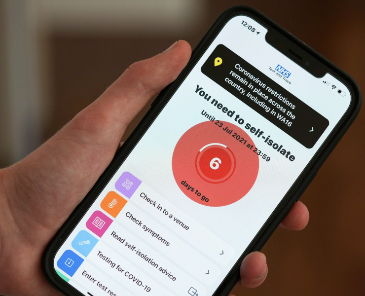 NHS self isolate message on a phone