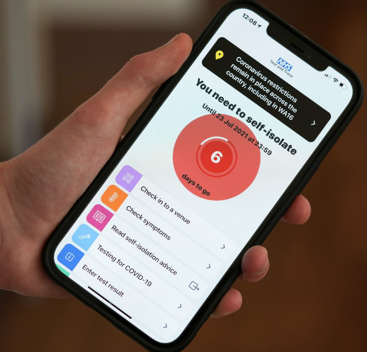 NHS self isolate message on a phone