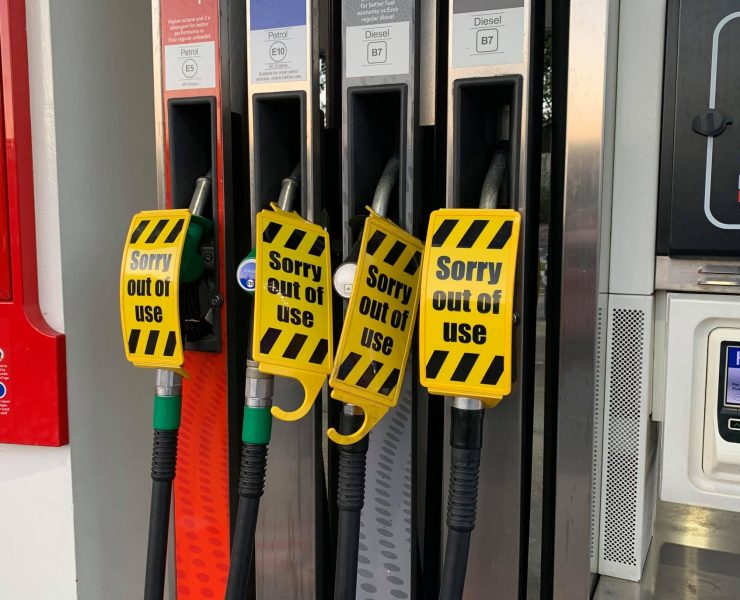 Out of use signs on petrol pumps