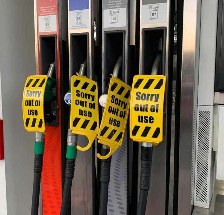 Out of use signs on petrol pumps