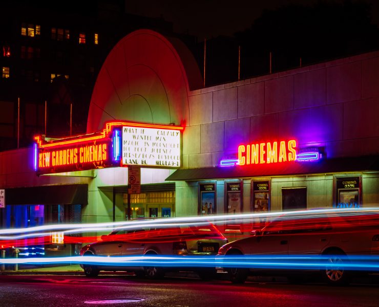 Neon lit movie theatee