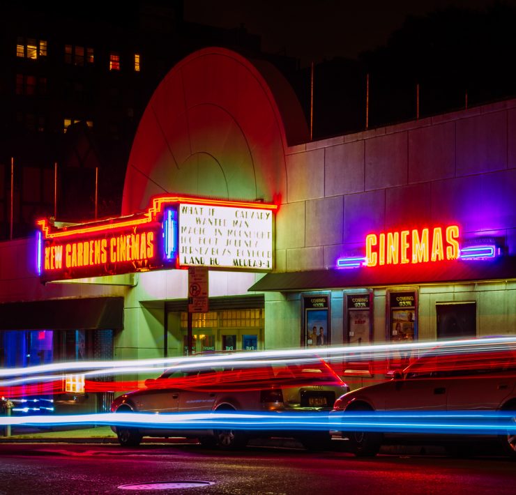 Neon lit movie theatee