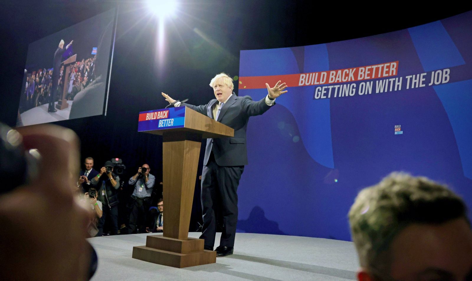 Boris Johnson on stage during the 2021 tory party conference