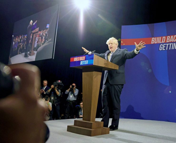 Boris Johnson on stage during the 2021 tory party conference