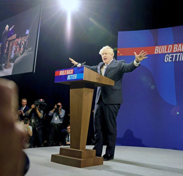 Boris Johnson on stage during the 2021 tory party conference
