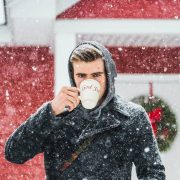 Man drinking tea in the snow