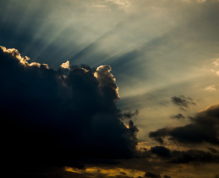 Rays of light behind a cloud