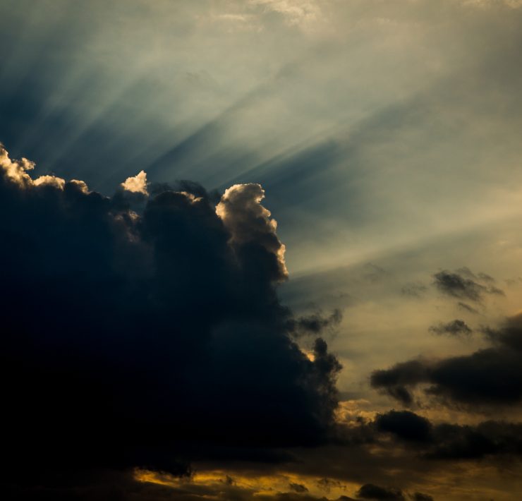 Rays of light behind a cloud