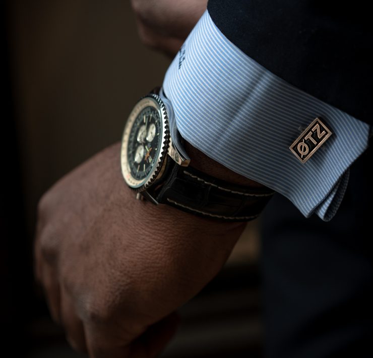 close up of a watch on a man's wrist