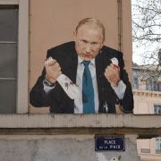 French graffiti with Putin holding a dead dove