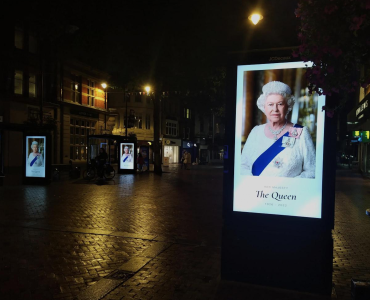 the Queen on electronic billboards