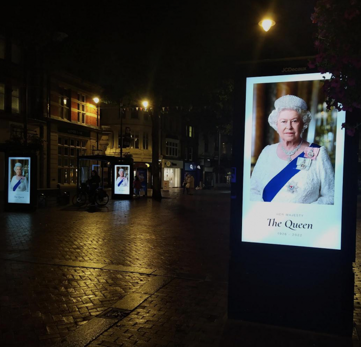 the Queen on electronic billboards