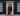 Number 10 Downing Street with Cheshire cat on doorstep