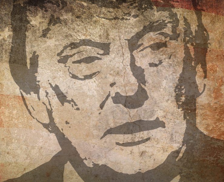 Donald Trump's face with us flag behind