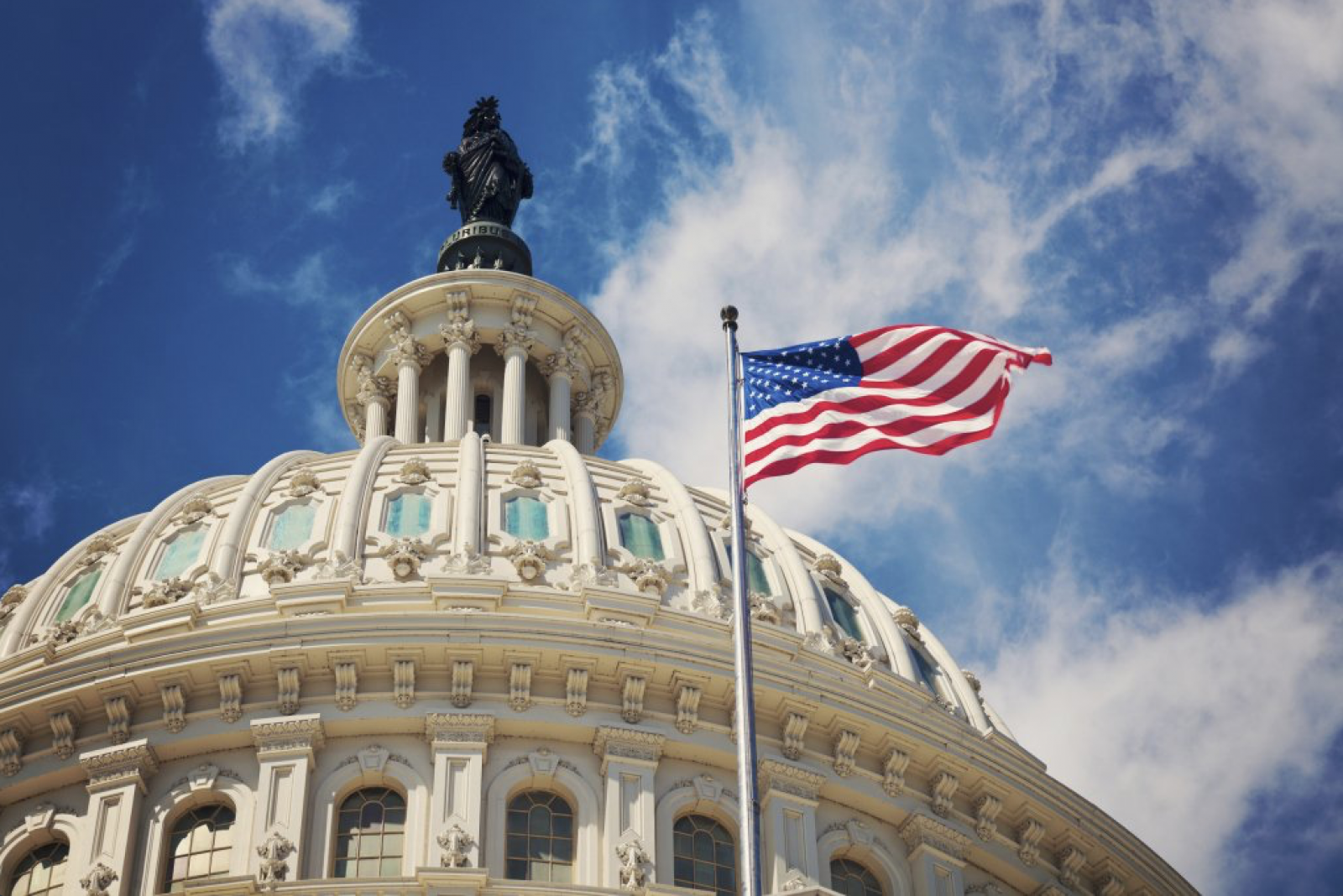 American flag outside the capitol building