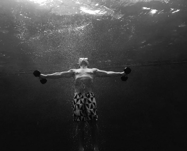 Laird Hamilton working out underwater