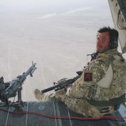 Jason Fox in back of Chinook. Picture from book Battle Scars
