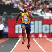 James Ellington racing in the 100 metres at the 2019 anniversary games
