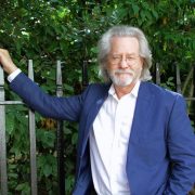 AC Grayling leaning on an iron fece