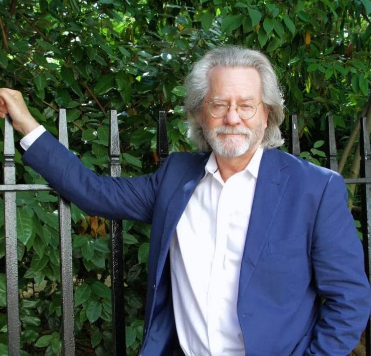 AC Grayling leaning on an iron fece