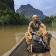 Ed Stafford on a long tail boat in southern Laos.