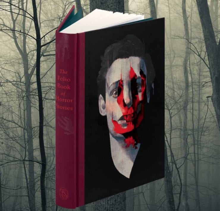The Folio Book of Horror Stories in front of a spooky wood backdrop