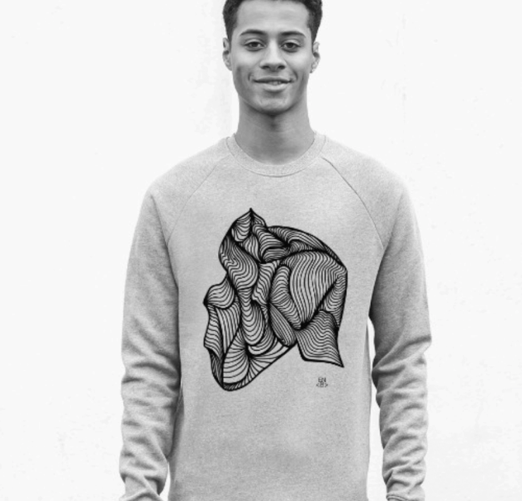 Model wearing a grey Enable8 jumper