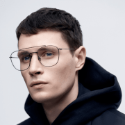 Model wearing Komono glasses